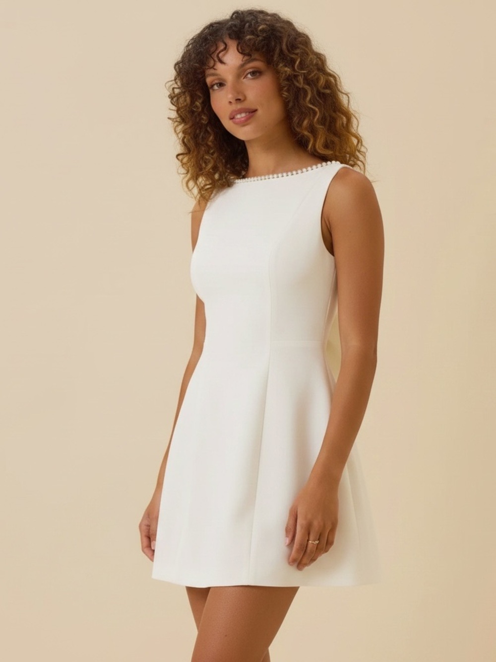 Leana Mini Dress -
Sleeveless White A-Line Mini Dress with Pearl Trim